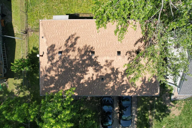 Aerial view of a Kansas City roofing project by Tucci Roofing Co.