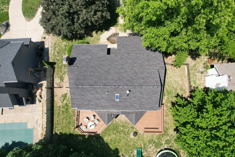 Tucci Roofing Co. roofing crew working on a Kansas City home